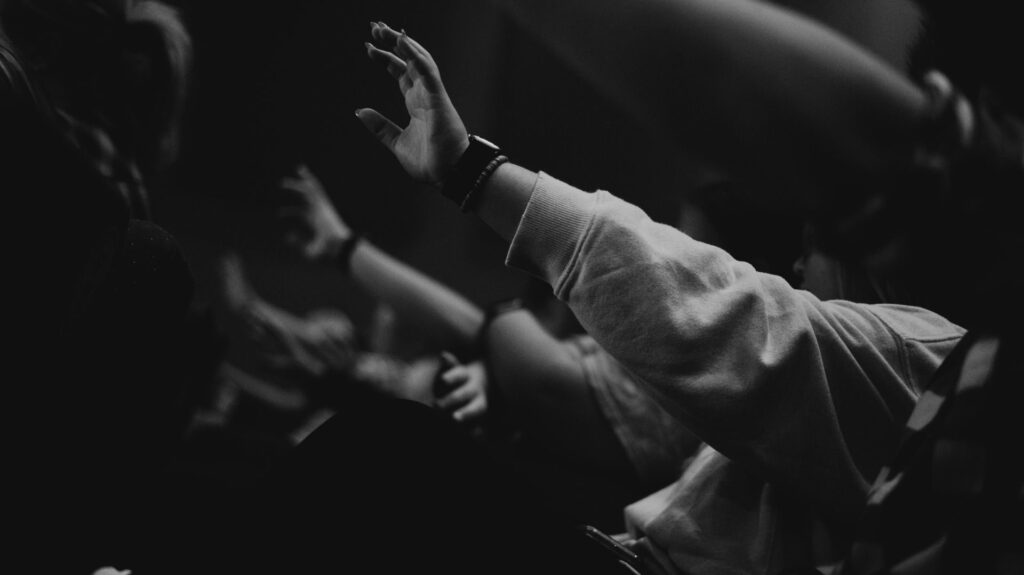 Hands raised in worship, from worship setlist
