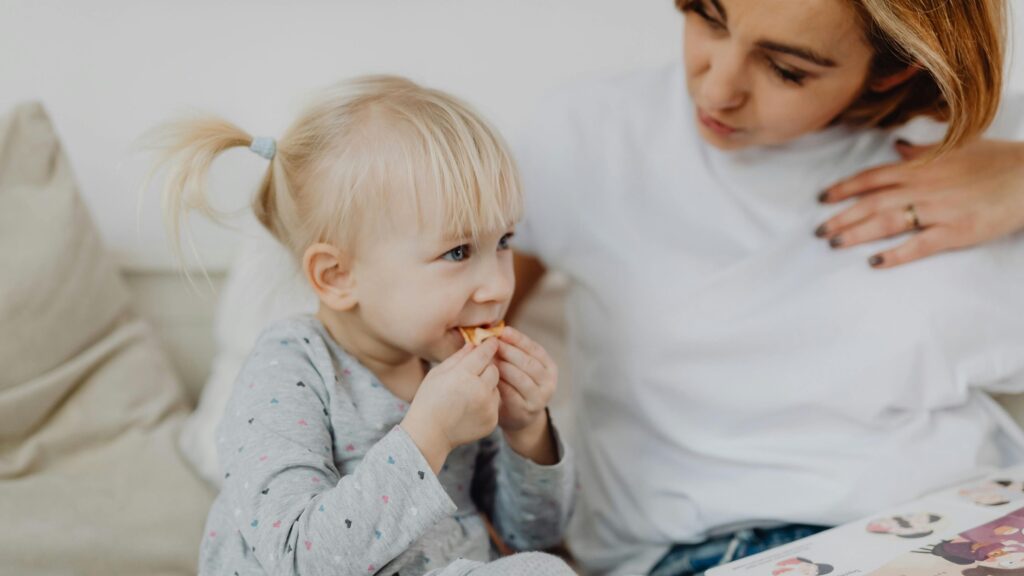 Mom and kid eating Bible Snacks